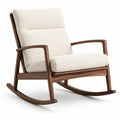 Sillón mecedora de madera con tapizado bouclé blanco